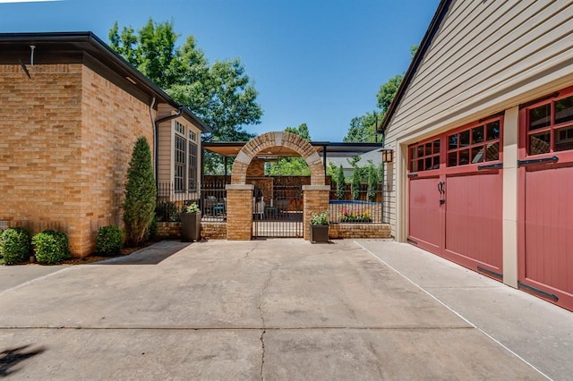 915 NW 40th St, Oklahoma City, OK 73118 - view of property exterior with brick siding and a gate