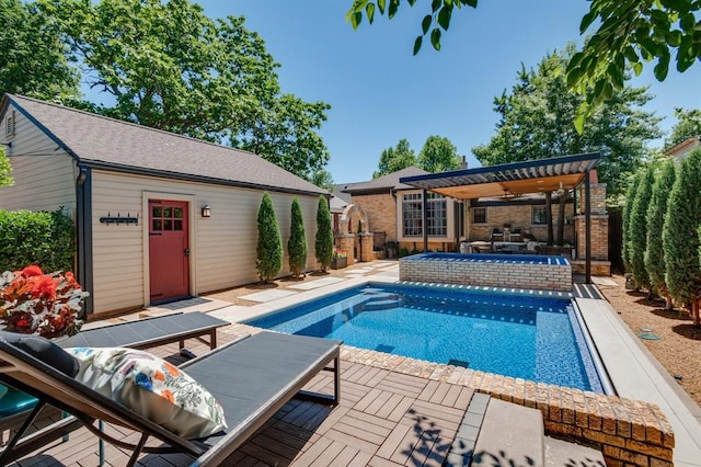 915 NW 40th St, Oklahoma City, OK 73118 - view of pool with an outdoor structure and a storage structure