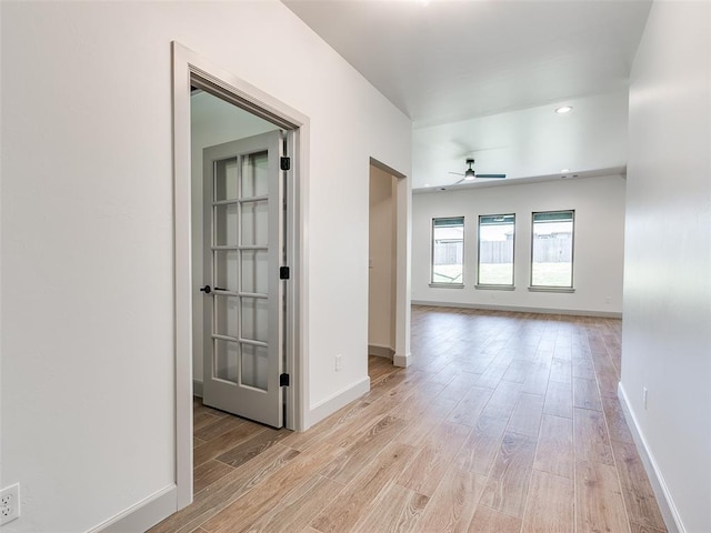 11508 NW 102nd St, Yukon, OK 73099 - corridor with light wood finished floors and baseboards