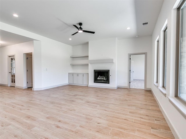 11508 NW 102nd St, Yukon, OK 73099 - unfurnished living room with a ceiling fan, light wood-style floors, baseboards, and recessed lighting