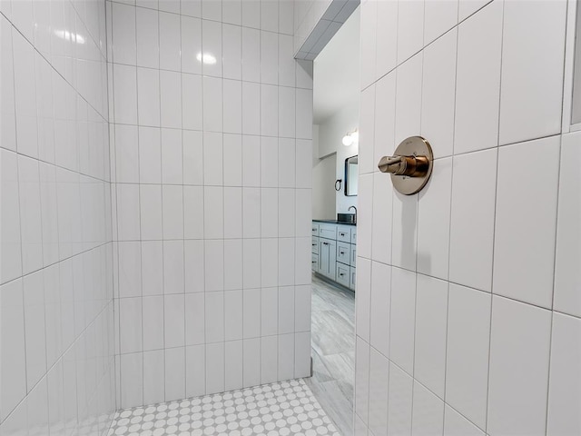 11508 NW 102nd St, Yukon, OK 73099 - full bath with tile walls, tiled shower, and a sink
