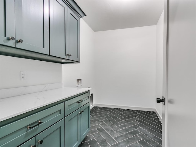 11508 NW 102nd St, Yukon, OK 73099 - laundry room with cabinet space, baseboards, and hookup for a washing machine
