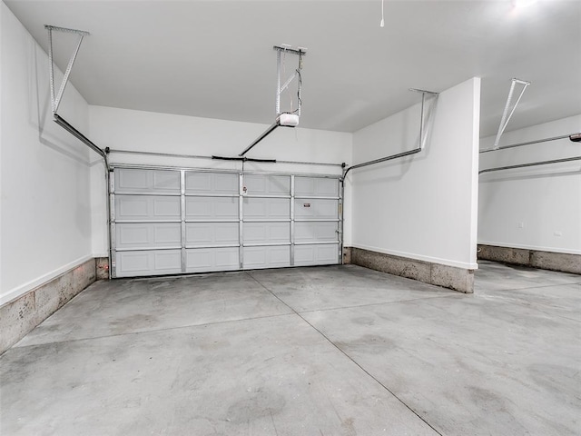 11508 NW 102nd St, Yukon, OK 73099 - garage featuring a garage door opener