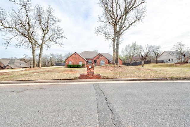 10904 Quail Run Rd, Oklahoma City, OK 73150 - traditional home featuring brick siding
