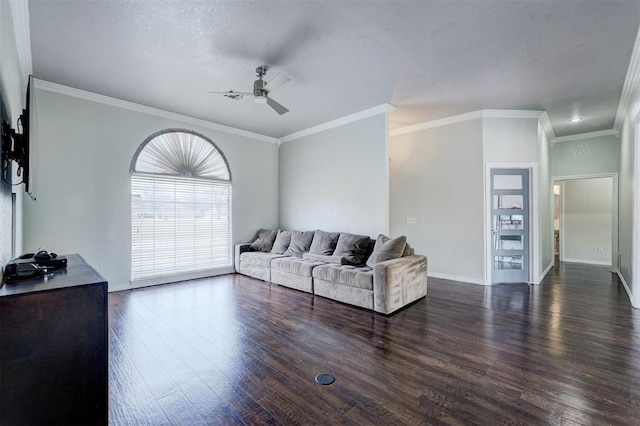 10904 Quail Run Rd, Oklahoma City, OK 73150 - living area featuring ceiling fan, dark wood finished floors, crown molding, and baseboards