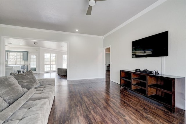 10904 Quail Run Rd, Oklahoma City, OK 73150 - living area featuring ornamental molding, ceiling fan, wood finished floors, and baseboards