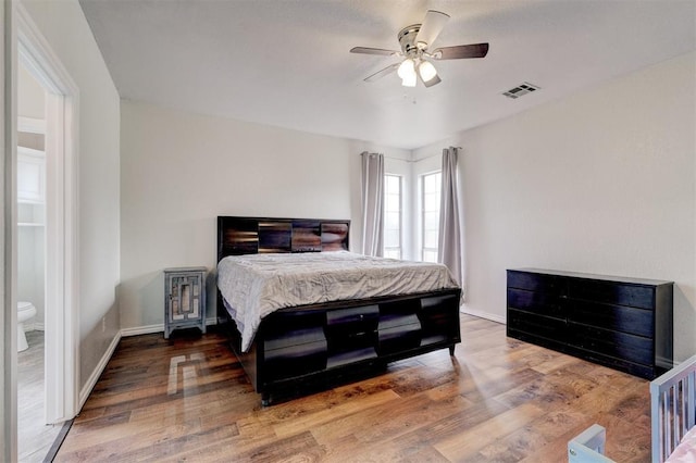 10904 Quail Run Rd, Oklahoma City, OK 73150 - bedroom featuring wood finished floors, baseboards, and ceiling fan