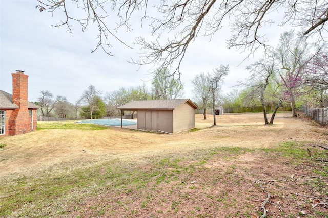 10904 Quail Run Rd, Oklahoma City, OK 73150 - view of yard featuring an outbuilding
