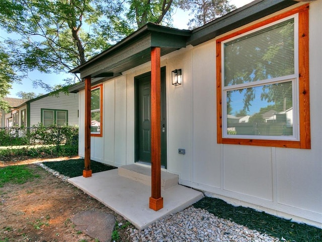 920 N Warren Ave, Oklahoma City, OK 73107 - view of exterior entry with board and batten siding
