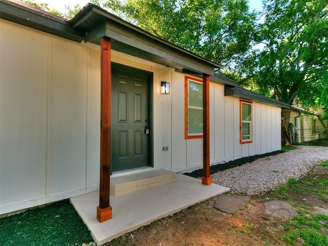 920 N Warren Ave, Oklahoma City, OK 73107 - doorway to property with board and batten siding