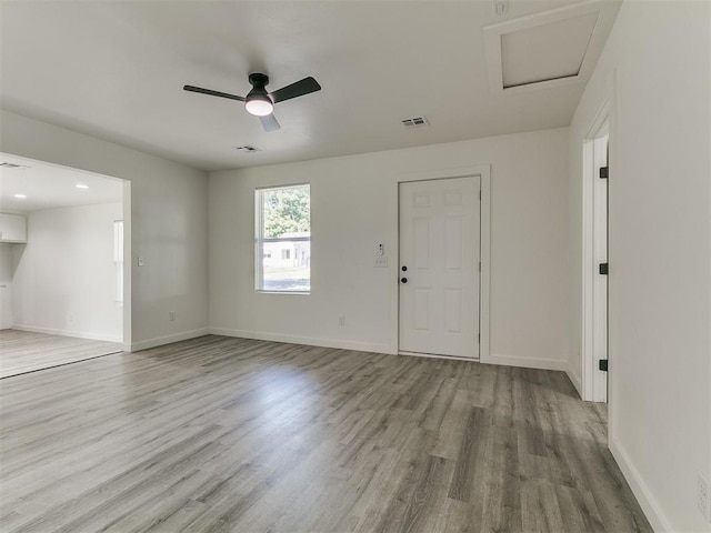 920 N Warren Ave, Oklahoma City, OK 73107 - empty room featuring wood finished floors, baseboards, and a ceiling fan