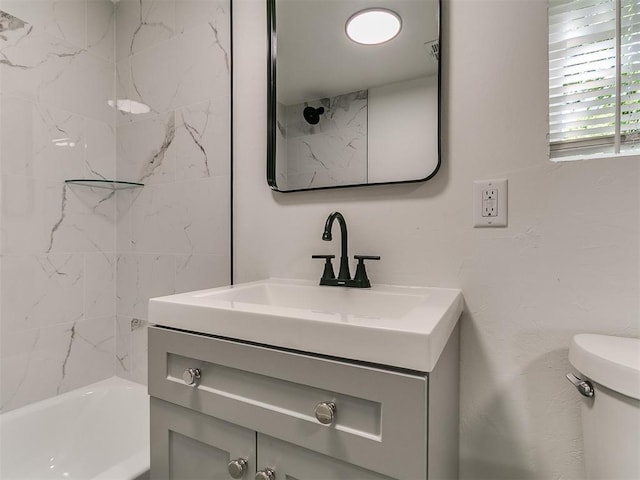 920 N Warren Ave, Oklahoma City, OK 73107 - bathroom featuring vanity, toilet, and shower / bathtub combination