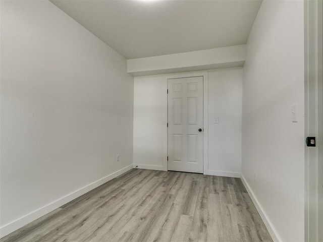 920 N Warren Ave, Oklahoma City, OK 73107 - unfurnished room featuring light wood-style floors and baseboards