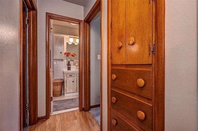 427 Foreman Ave, Norman, OK 73069 - hall featuring light wood-style flooring and baseboards
