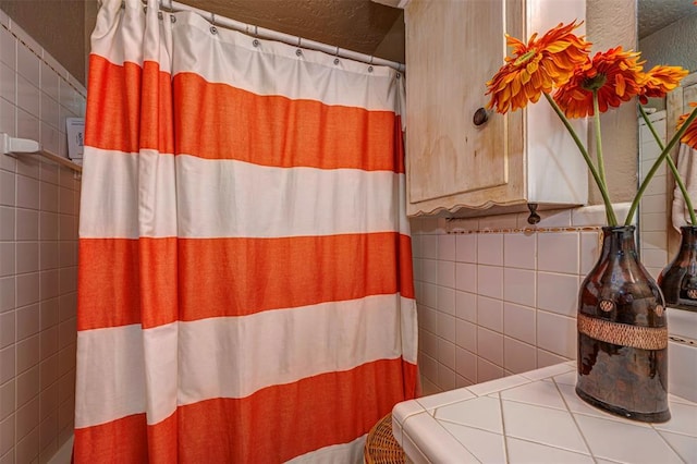 427 Foreman Ave, Norman, OK 73069 - full bath featuring tile walls and a shower with shower curtain