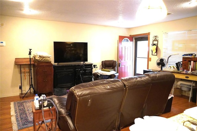 14305 N Pennsylvania Ave Unit 2C, Oklahoma City, OK 73134 - living room featuring wood finished floors and baseboards