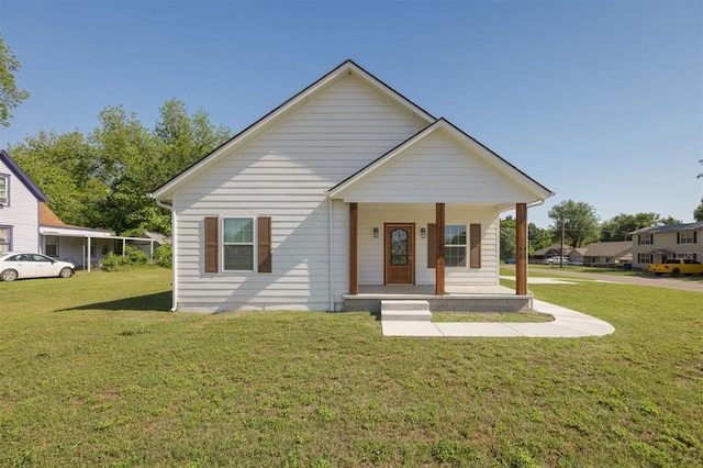 1102 W Mansur Ave, Guthrie, OK 73044 - bungalow-style house with covered porch and a front lawn