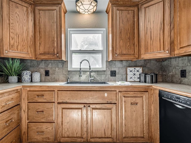 9290 N Hiwassee Rd, Jones, OK 73049 - kitchen with black dishwasher, a sink, tasteful backsplash, and brown cabinets