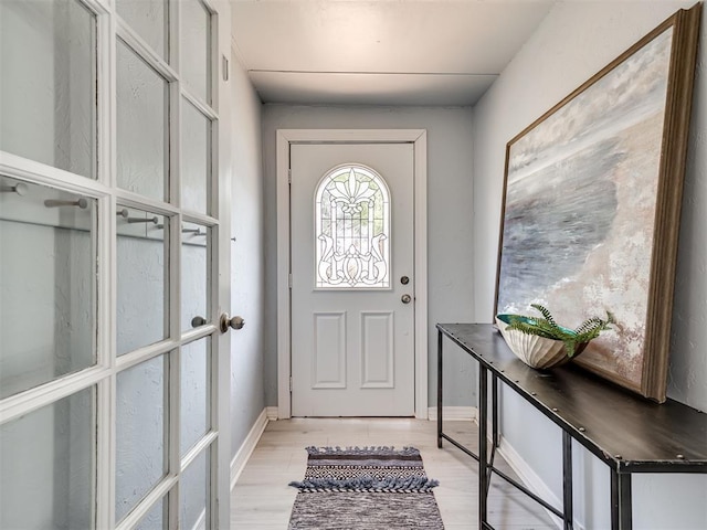9290 N Hiwassee Rd, Jones, OK 73049 - doorway featuring light wood-type flooring and baseboards