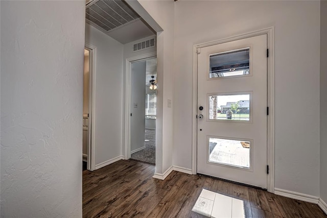 8516 Gibbs Dr, Oklahoma City, OK 73135 - foyer featuring healthy amount of natural light, dark wood-type flooring, and baseboards