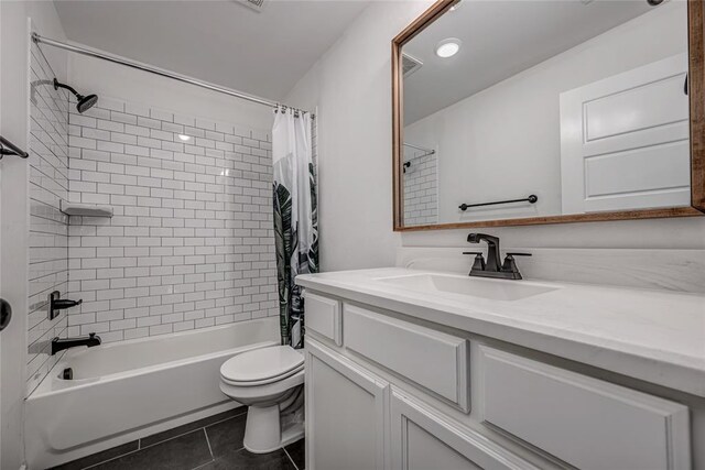 8516 Gibbs Dr, Oklahoma City, OK 73135 - full bathroom with vanity, shower / tub combo, tile patterned floors, and toilet