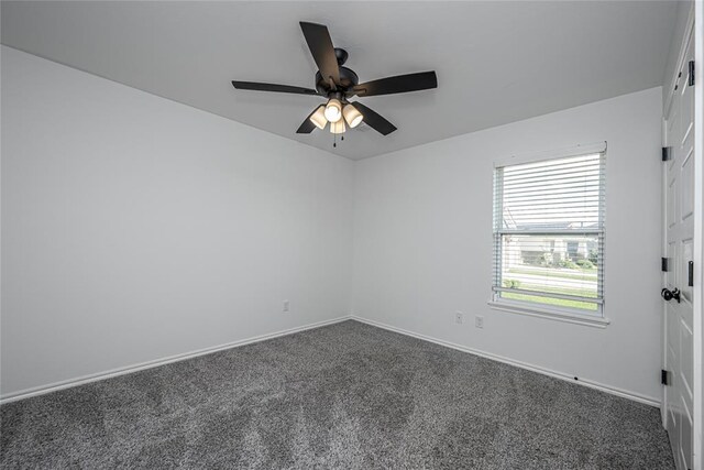 8516 Gibbs Dr, Oklahoma City, OK 73135 - unfurnished room with dark colored carpet, baseboards, and ceiling fan