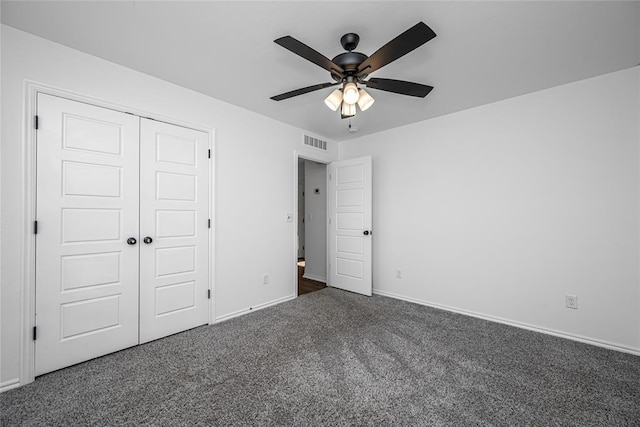 8516 Gibbs Dr, Oklahoma City, OK 73135 - unfurnished bedroom with carpet flooring, a closet, baseboards, and a ceiling fan