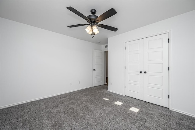 8516 Gibbs Dr, Oklahoma City, OK 73135 - unfurnished bedroom featuring carpet flooring, a closet, baseboards, and ceiling fan