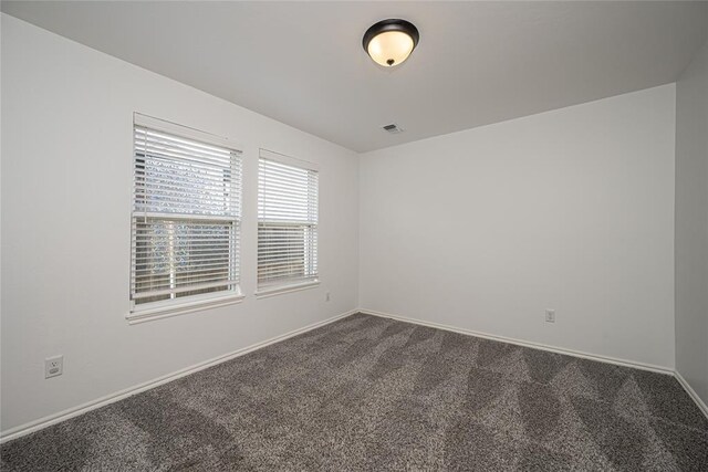 8516 Gibbs Dr, Oklahoma City, OK 73135 - unfurnished room with dark carpet and baseboards