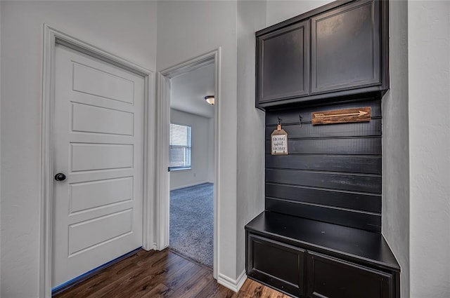 8516 Gibbs Dr, Oklahoma City, OK 73135 - mudroom with dark wood-style flooring and baseboards