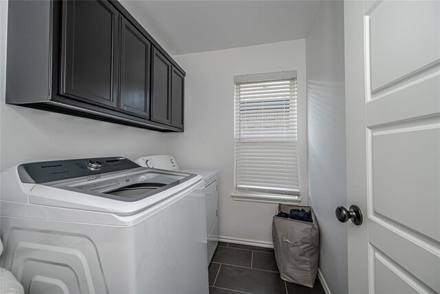 8516 Gibbs Dr, Oklahoma City, OK 73135 - laundry room with separate washer and dryer, baseboards, cabinet space, and dark tile patterned flooring