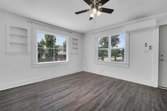 815 Hayes Ave, Clinton, OK 73601 - spare room with wood finished floors, plenty of natural light, and a ceiling fan