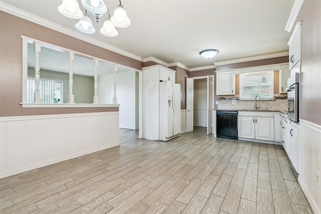 4333 NW 55th St, Oklahoma City, OK 73112 - kitchen featuring white fridge with ice dispenser, dishwasher, stainless steel oven, a sink, and light wood-style floors