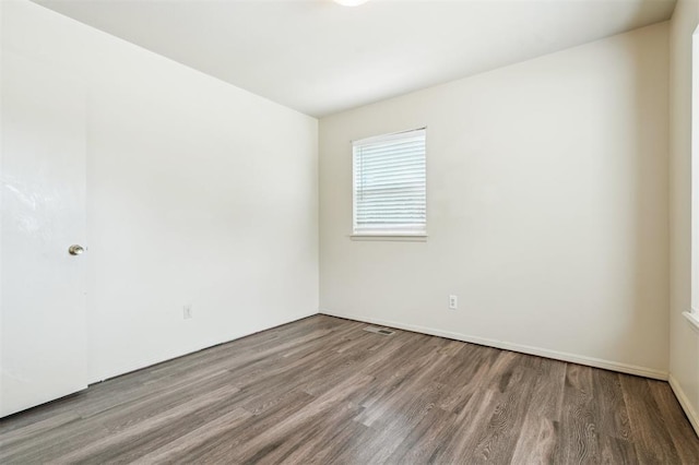 4333 NW 55th St, Oklahoma City, OK 73112 - unfurnished room with wood finished floors and baseboards