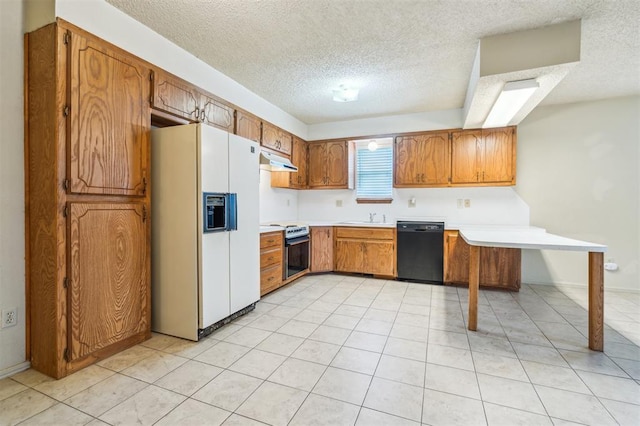 4333 NW 55th St, Oklahoma City, OK 73112 - kitchen with white refrigerator with ice dispenser, dishwasher, range, under cabinet range hood, and a sink