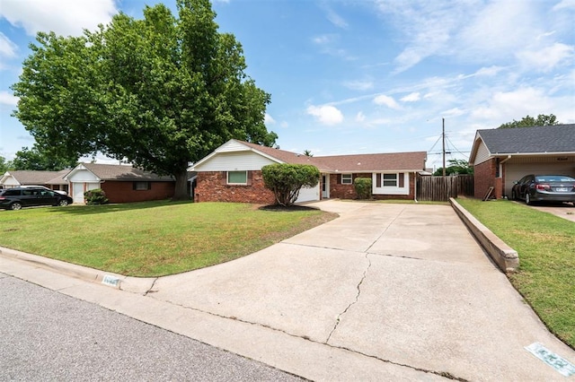 4333 NW 55th St, Oklahoma City, OK 73112 - ranch-style home featuring concrete driveway, brick siding, and a garage