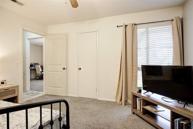 809 Cardinal Creek Blvd, Norman, OK 73072 - bedroom with light carpet, an office area, and ceiling fan
