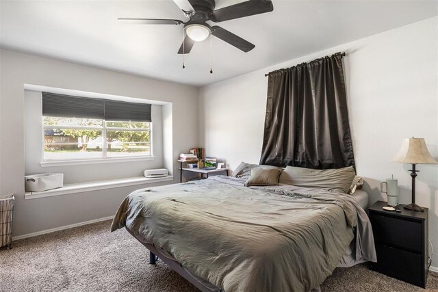 16 Clark Cir, Shawnee, OK 74804 - bedroom featuring carpet flooring, baseboards, and a ceiling fan