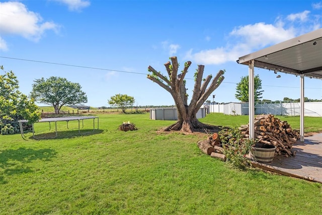 16 Clark Cir, Shawnee, OK 74804 - view of yard featuring a trampoline