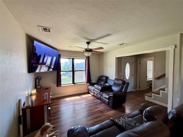1000 Winnipeg Dr, Yukon, OK 73099 - living room with a textured ceiling, plenty of natural light, wood finished floors, and a ceiling fan