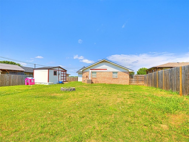 1810 Haynie Ln, Prague, OK 74864 - view of yard featuring a fire pit
