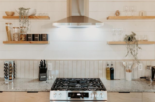 2 Timber Passage Trl, Broken Bow, OK 74728 - kitchen with stainless steel gas stove, wall chimney range hood, open shelves, and light stone countertops