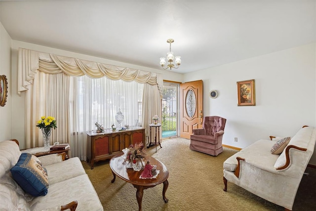 111 W Colorado Ave, Okarche, OK 73762 - living area featuring a chandelier, light colored carpet, and baseboards