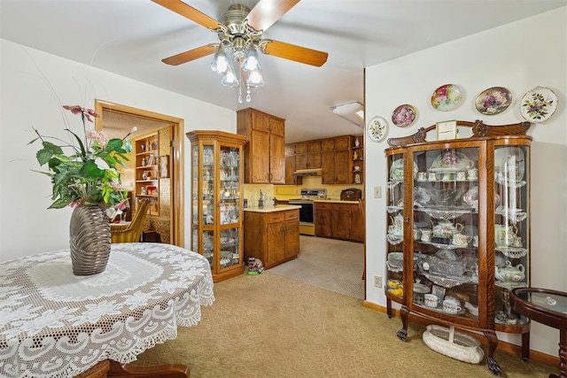 111 W Colorado Ave, Okarche, OK 73762 - dining space featuring light carpet and ceiling fan