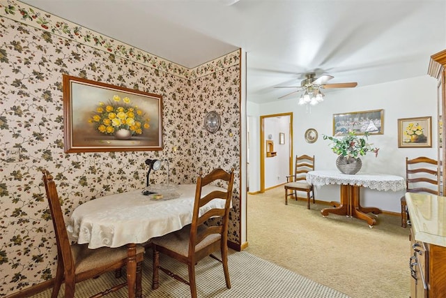 111 W Colorado Ave, Okarche, OK 73762 - carpeted dining room with baseboards, wallpapered walls, and ceiling fan