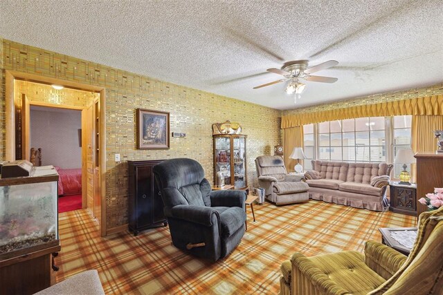 111 W Colorado Ave, Okarche, OK 73762 - carpeted living area featuring ceiling fan and a textured ceiling