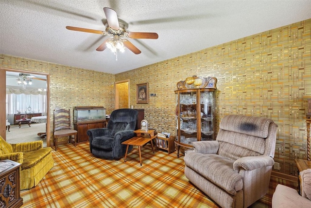 111 W Colorado Ave, Okarche, OK 73762 - living area featuring a ceiling fan and a textured ceiling