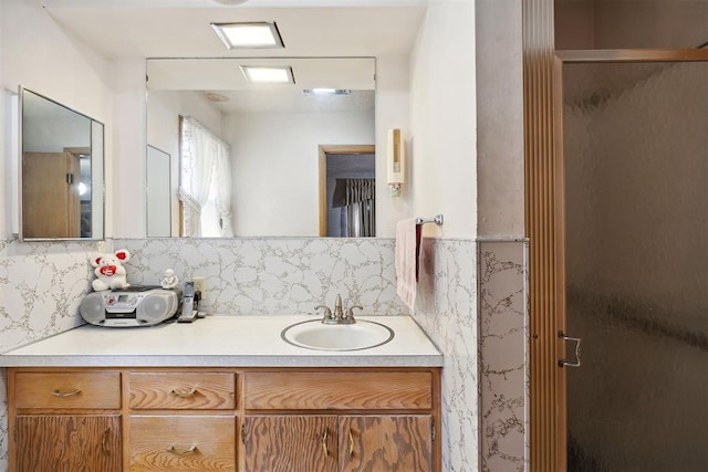 111 W Colorado Ave, Okarche, OK 73762 - bathroom with vanity, backsplash, and a shower stall