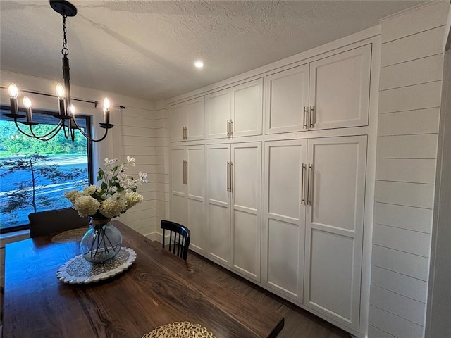 11790 E Etowah Rd, Noble, OK 73068 - dining space with a chandelier, dark wood-style floors, a textured ceiling, and recessed lighting