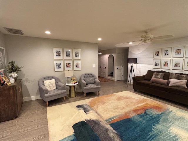 11790 E Etowah Rd, Noble, OK 73068 - living area with arched walkways, a ceiling fan, recessed lighting, wood finished floors, and baseboards